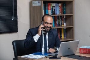 Lawyer in office on phone call